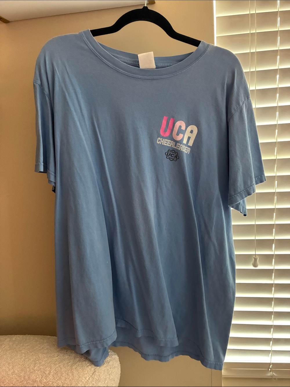 Varsity UCA Cheerleader Light Blue Tee with Pink & White Logo